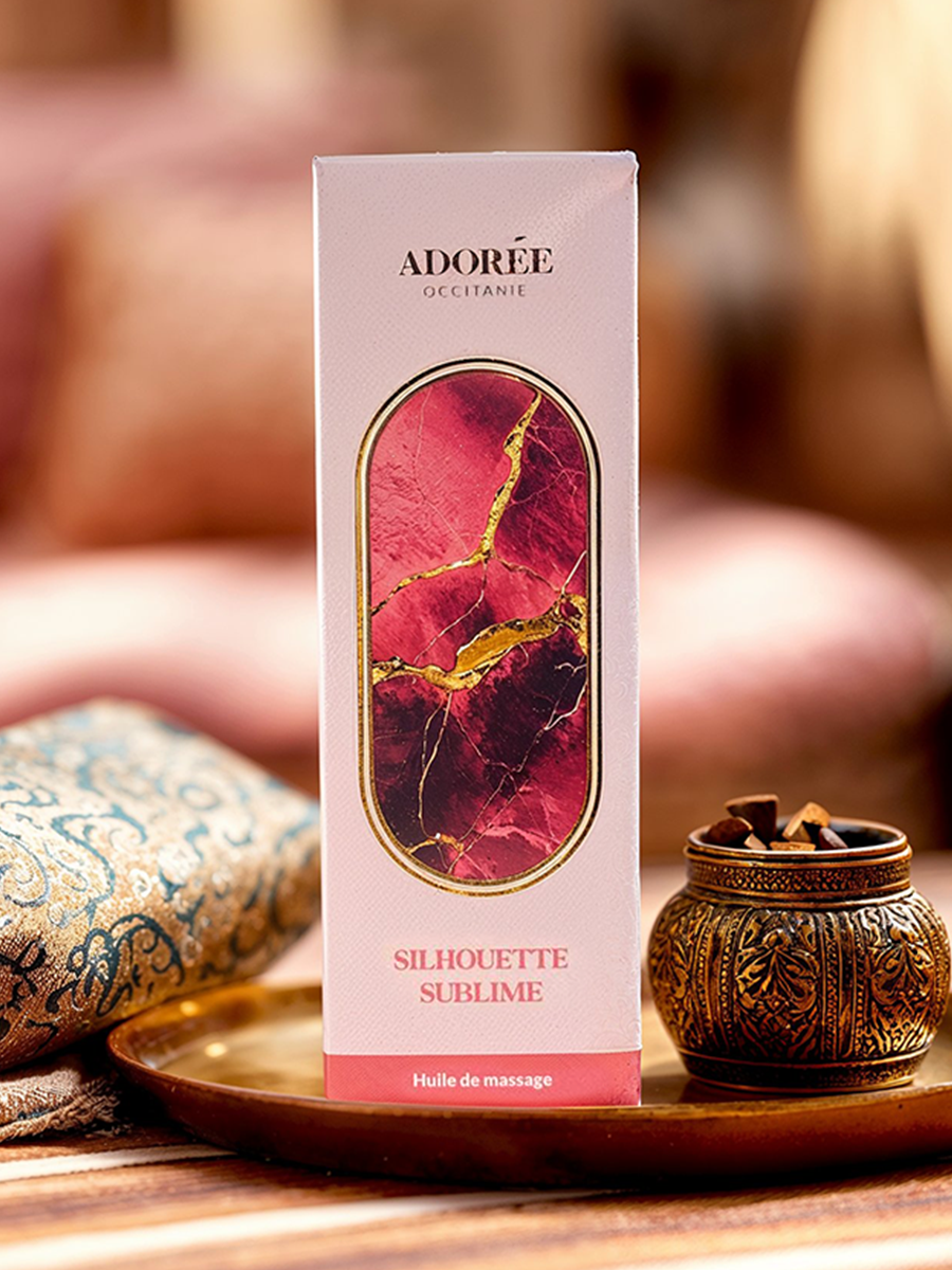 Huile affinante Silhouette Sublime avec packaging et décor chaleureux